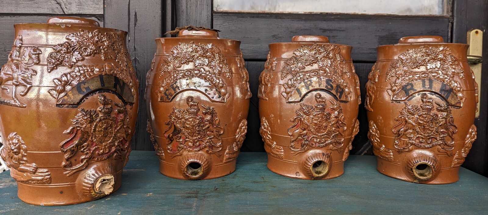 Set of 4 Brampton stoneware spirit barrels Early C19 inc brass taps. Magnificent