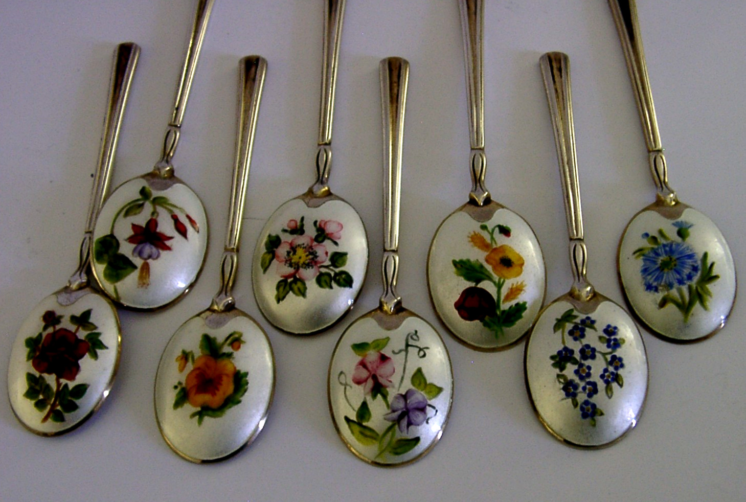 EIGHT STUNNING SOLID STERLING SILVER ENAMELLED FLOWER SPOONS 1972