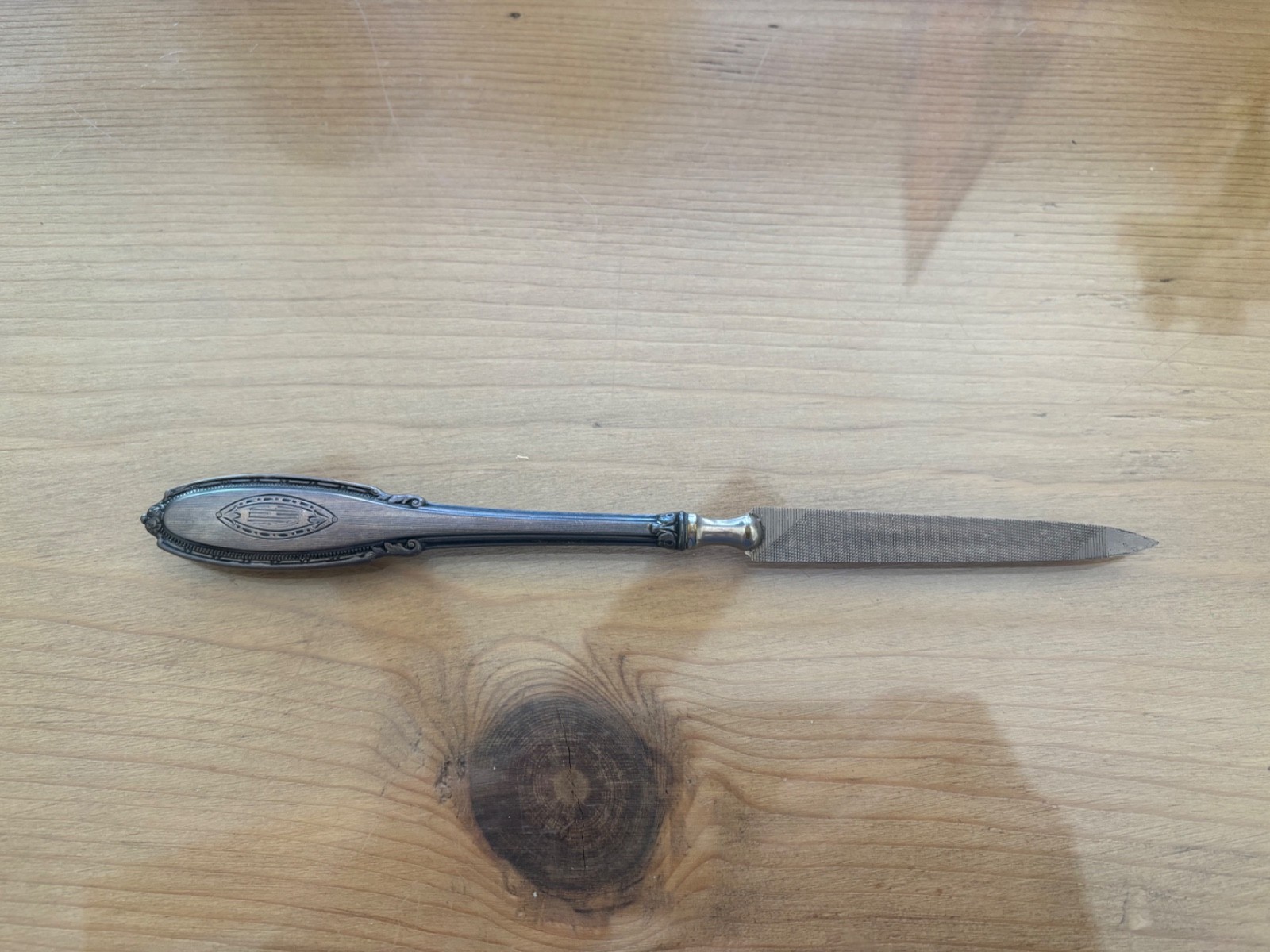 antique sterling silver nail file handle is monogrammed