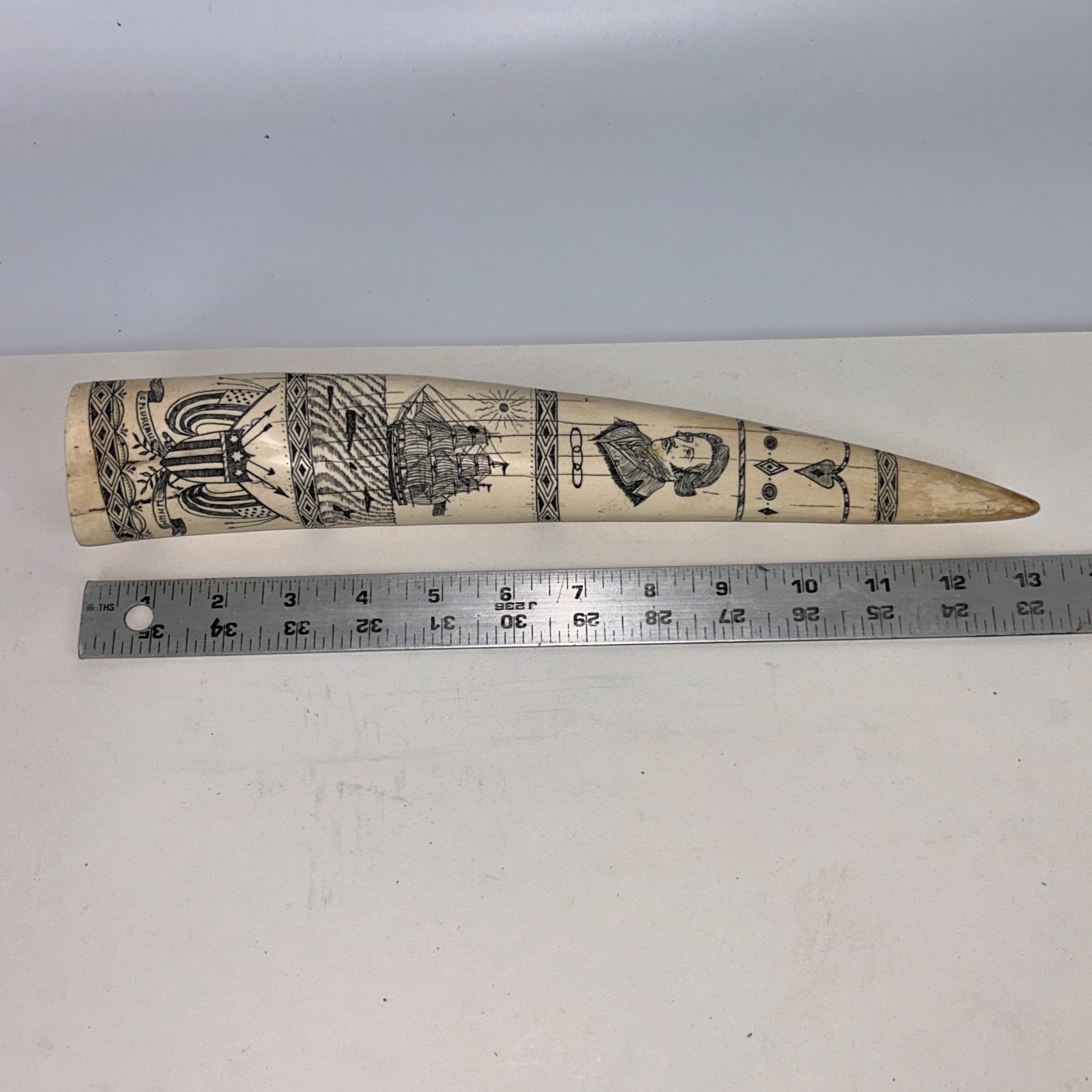 Scrimshaw Replica Walrus Tusk “Regulus” Captain James Head Ivory-color Resin 14″