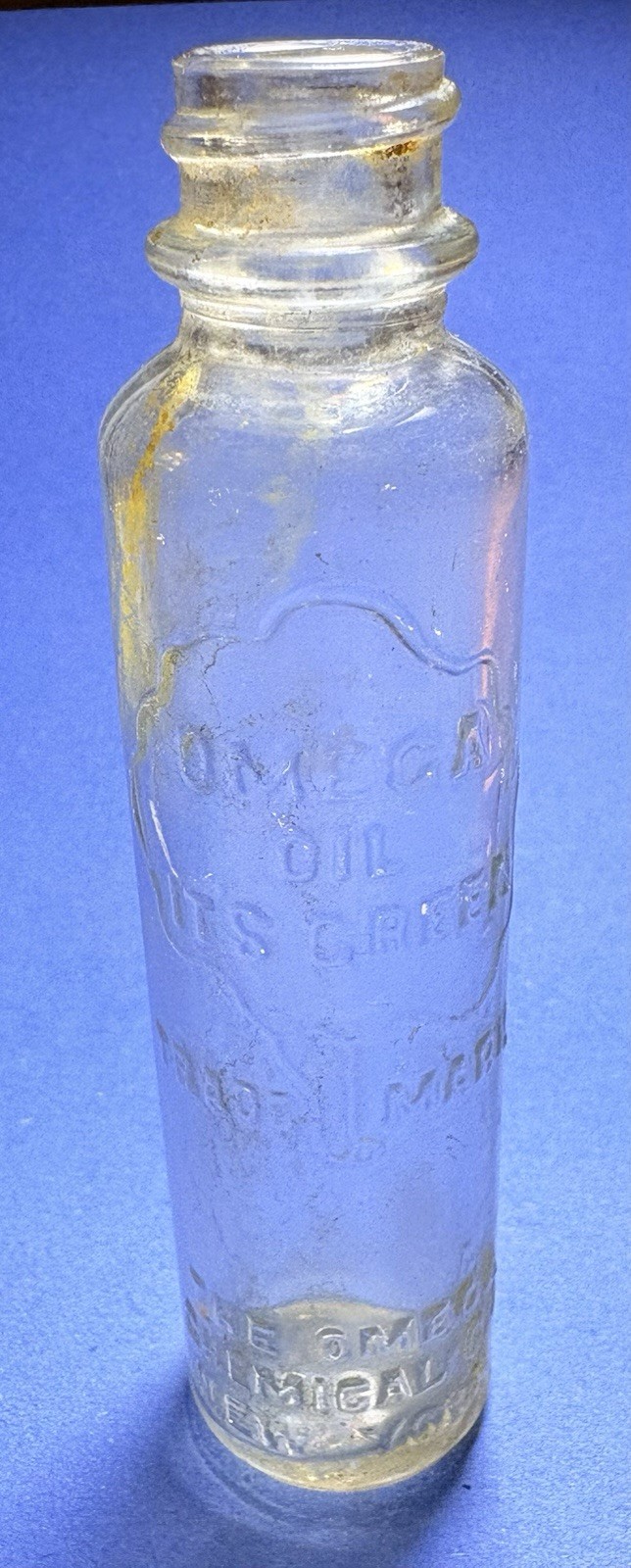 **Antique**1915-1925**Omega Oil Liniment Bottle*The Omega Chemical Company*