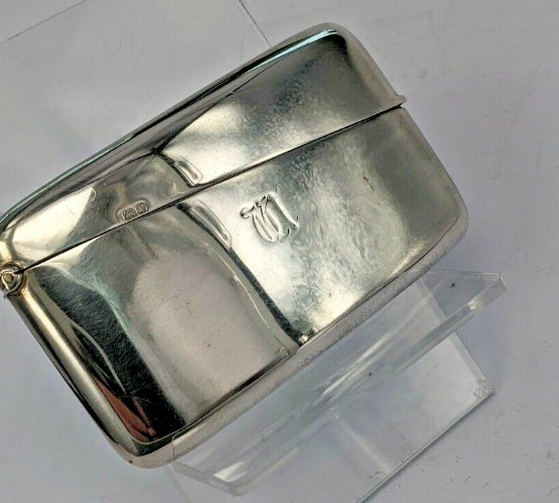 1916 Solid silver card case.by Cornelius Desormeaux Saunders