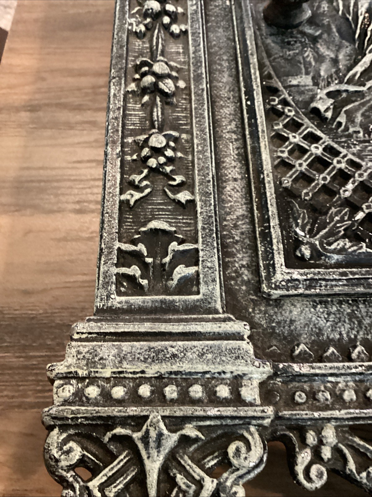 Antique cast iron fireplace door repurposed into wall mounted safe/jewelry box