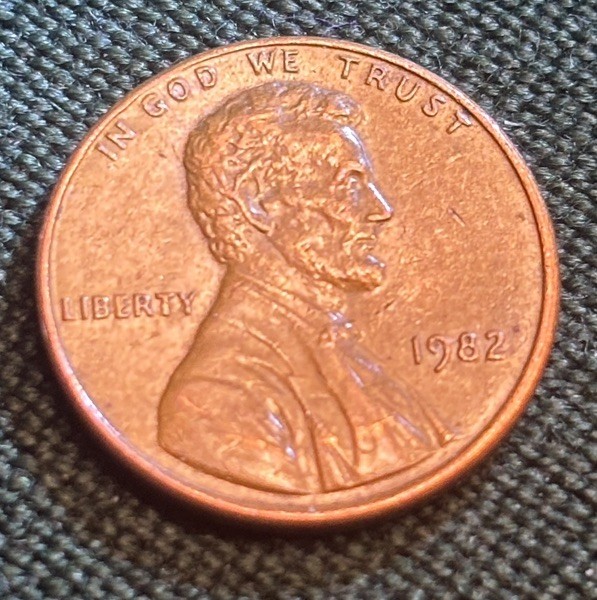 1982 Copper Penny. Small date no mint mark. 3.1 grams Struck Slightly Off Center