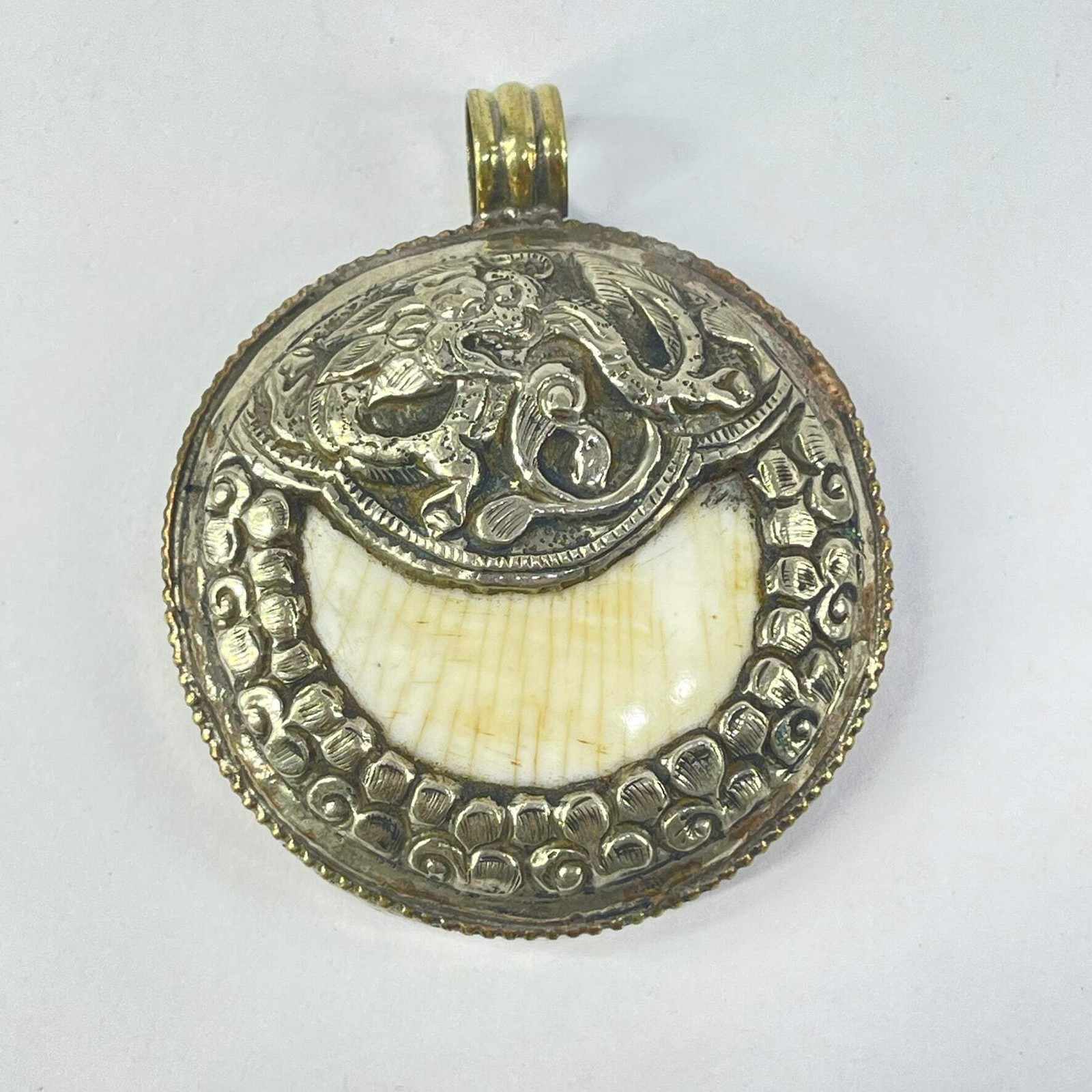 Tibetan Chank Shell Repoussé Pendant