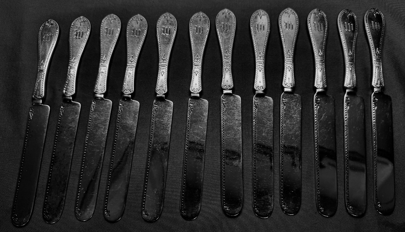 12 sterling tea knives 22 troy ounces 7 7/8″ Crosby Morse & Foss