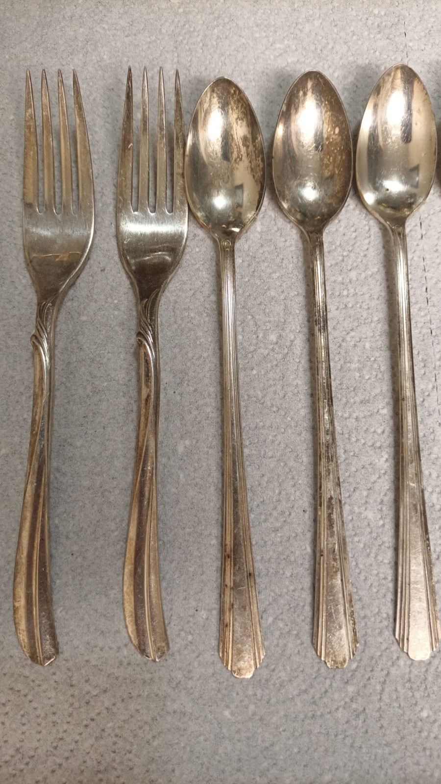 silver-plated flatware from brands such as International Silver and Wm. Rogers &