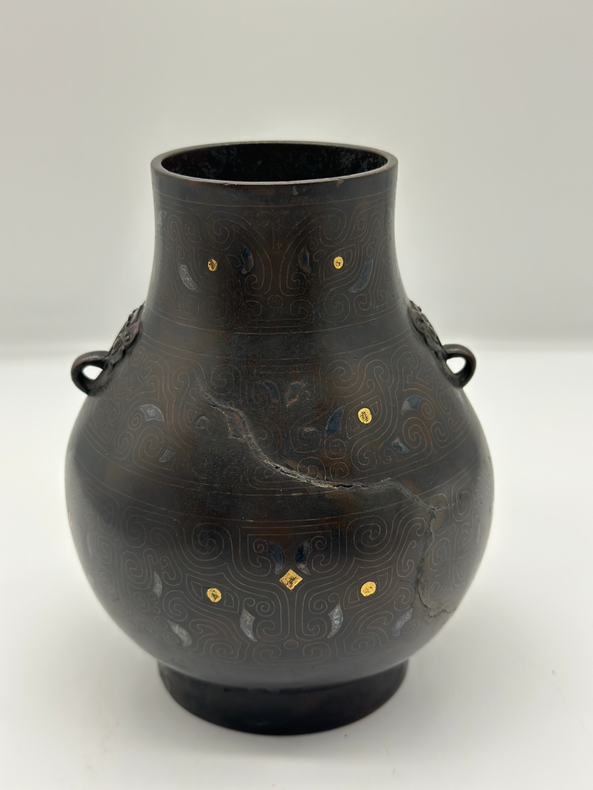 An Antique Bronze Vessel with Taotie Motif