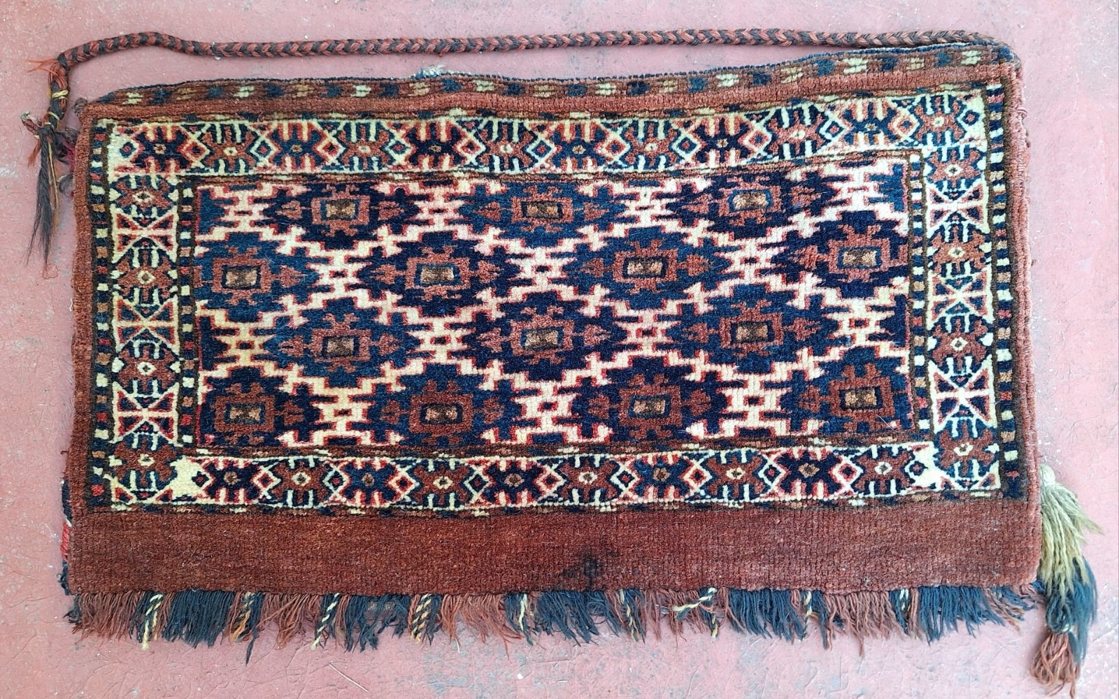 An antique 19 th C. Turkmen Yomud Mafrash, rare Aksu design, 27″ x 15″