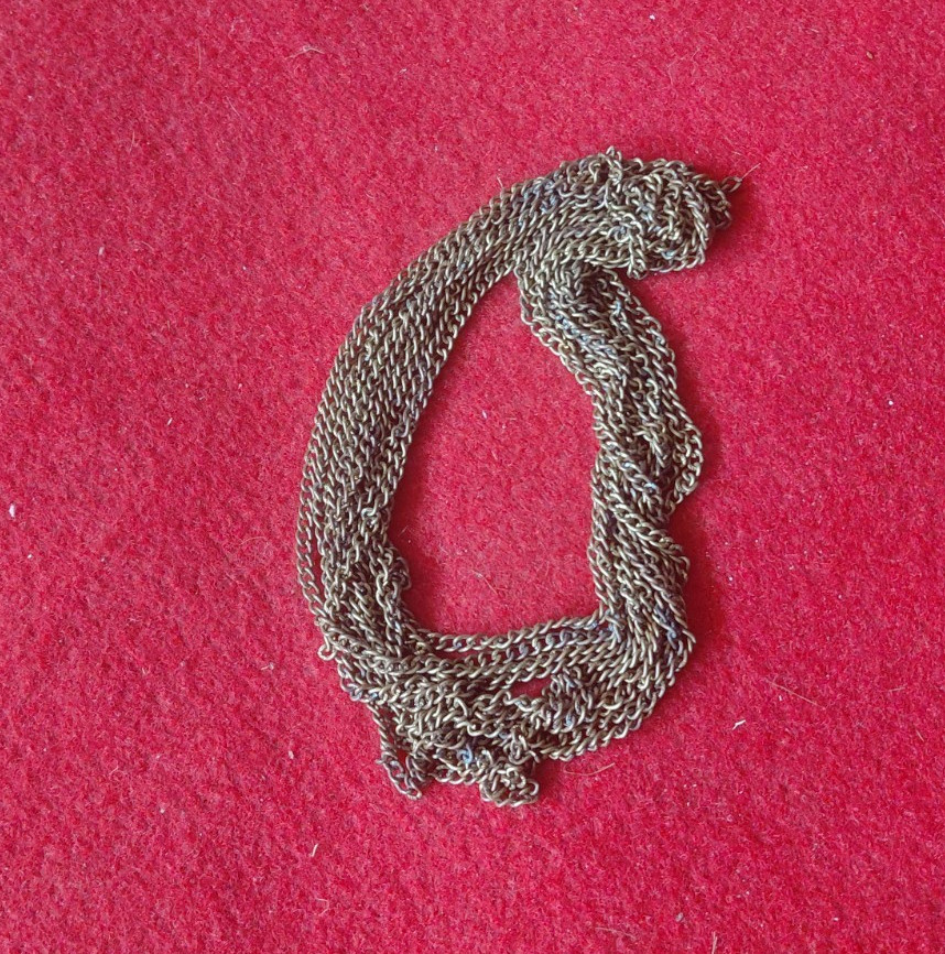 Antique BrassIt Appears To Be A Decorative Accessory Or A Piece Of Jewelry