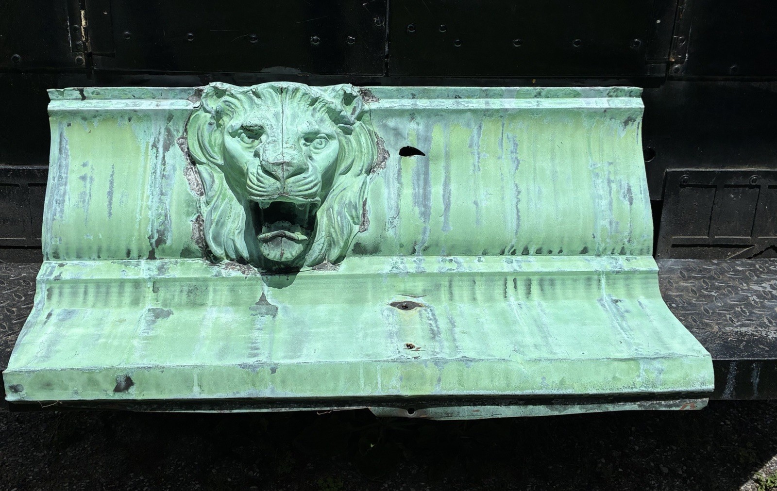 A Copper Lion Head On Panel Cornice from NYC West Side Architectural Salvage