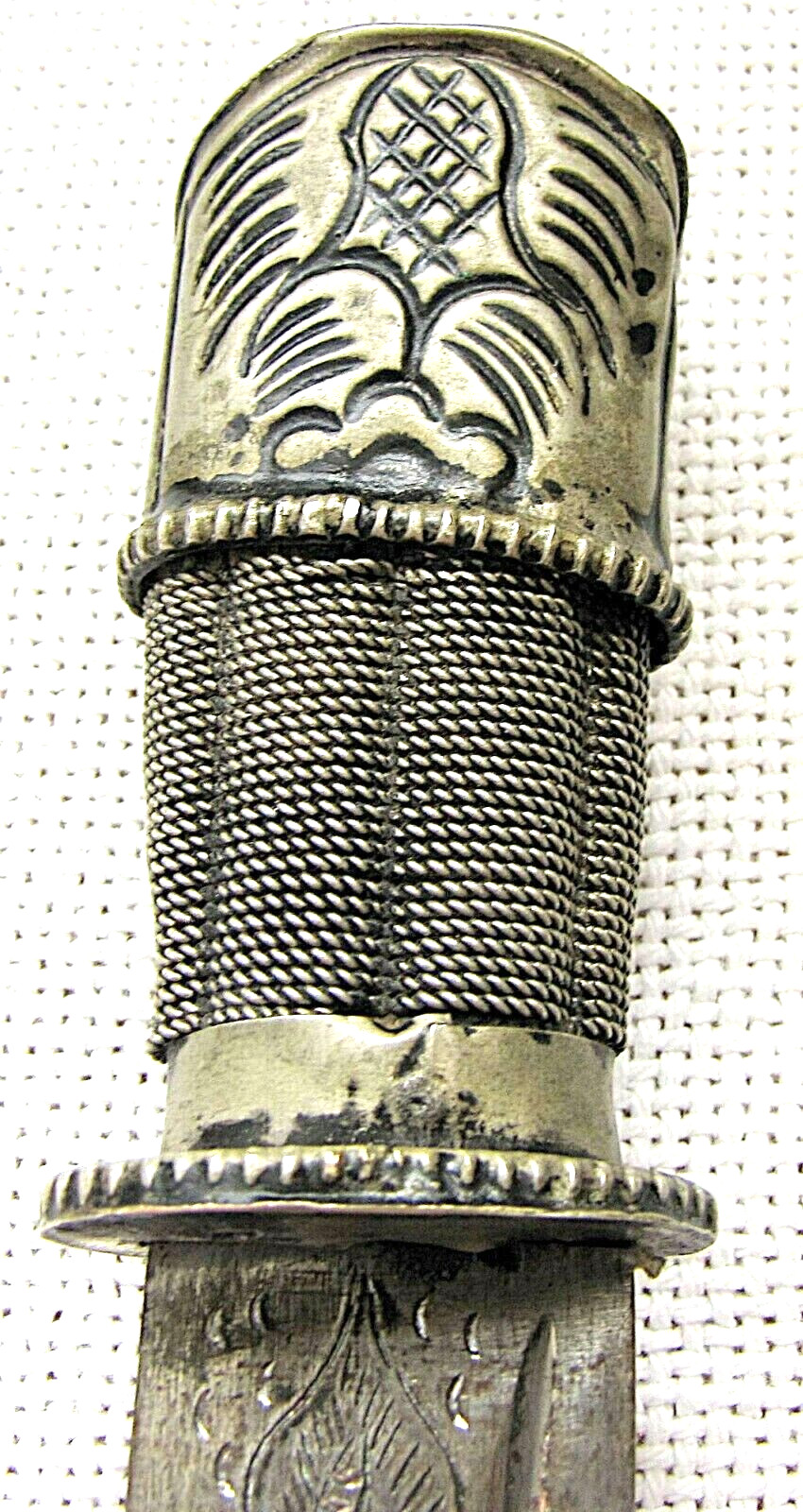Tibet Antique low grade silver dagger with dragon, marked engraved steel blade.