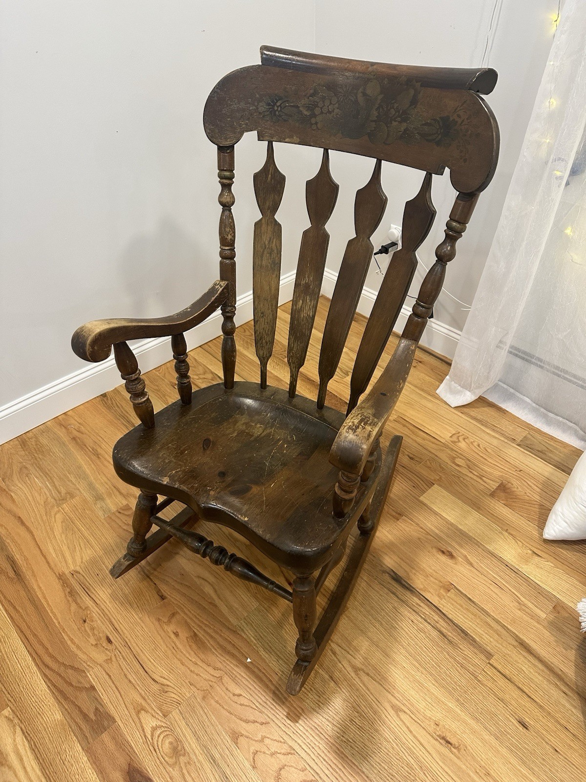 Vintage Wooden Rocking Chair with Spindle Back Design