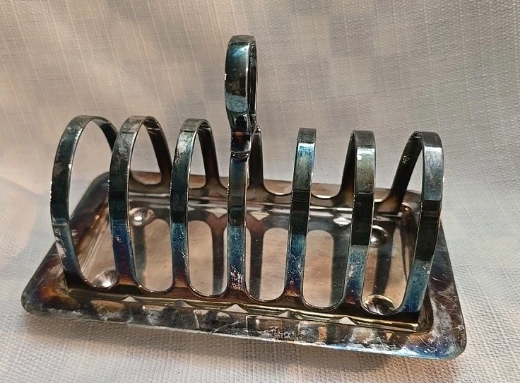 Vintage English EPNS toast rack with integrated butter Dish