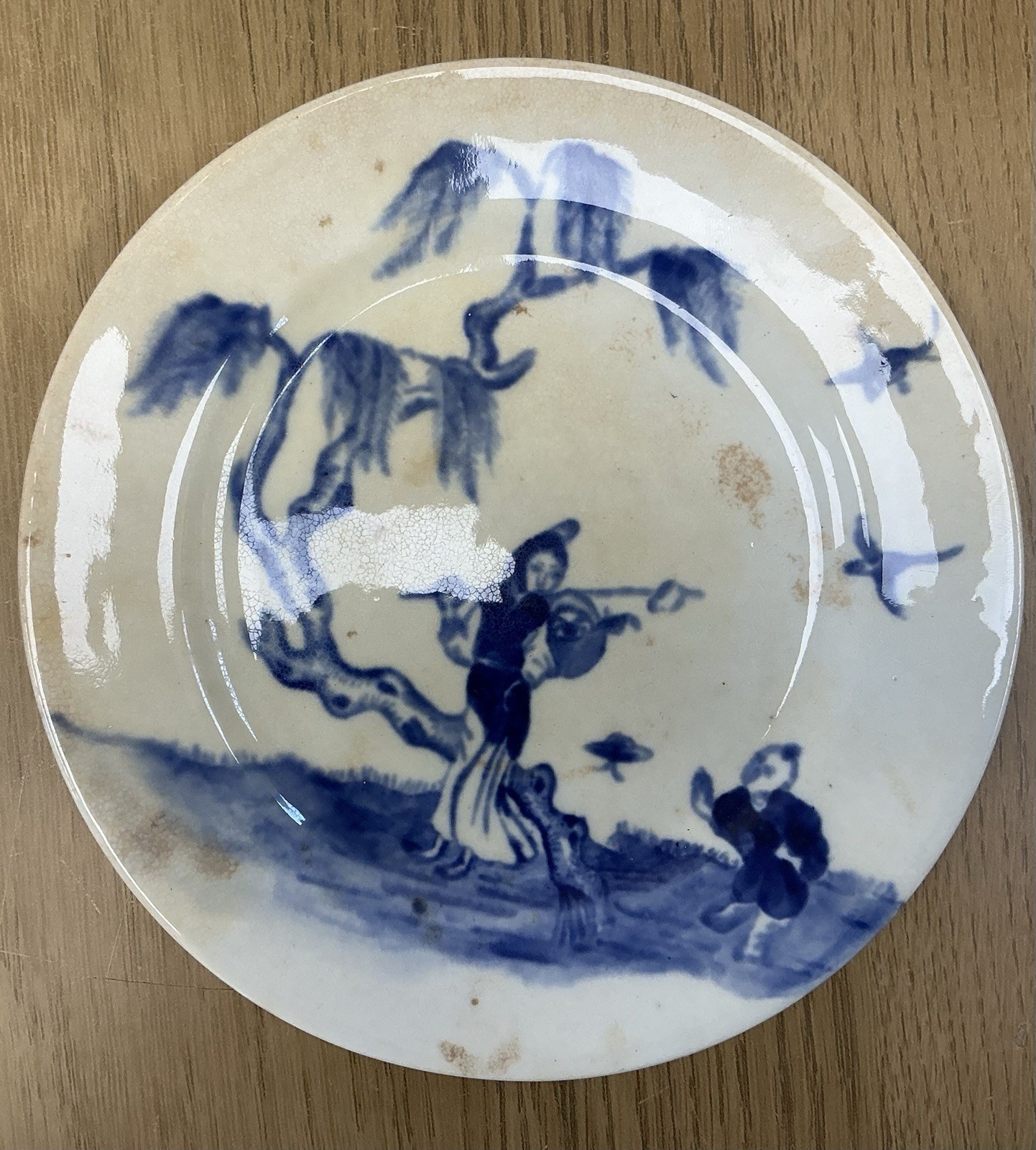 a mid-19th century European ceramic plate in the Chinoiserie style Plus Another