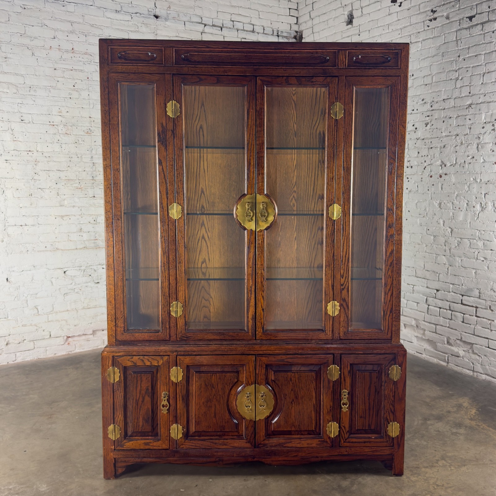 Campaign or Chinoiserie Style Lighted China Hutch by Bernhardt Dark Oak & Brass