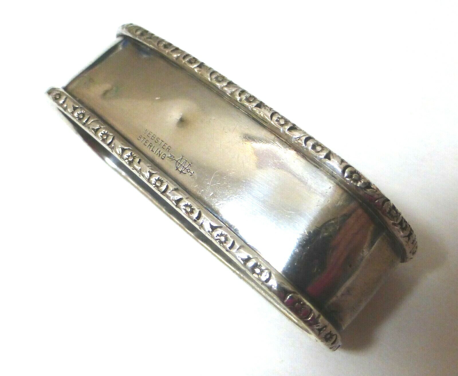 ANTIQUE WEBSTER SILVER CO. OVAL STERLING SILVER NAPKIN RING WITH BORDER DECOR