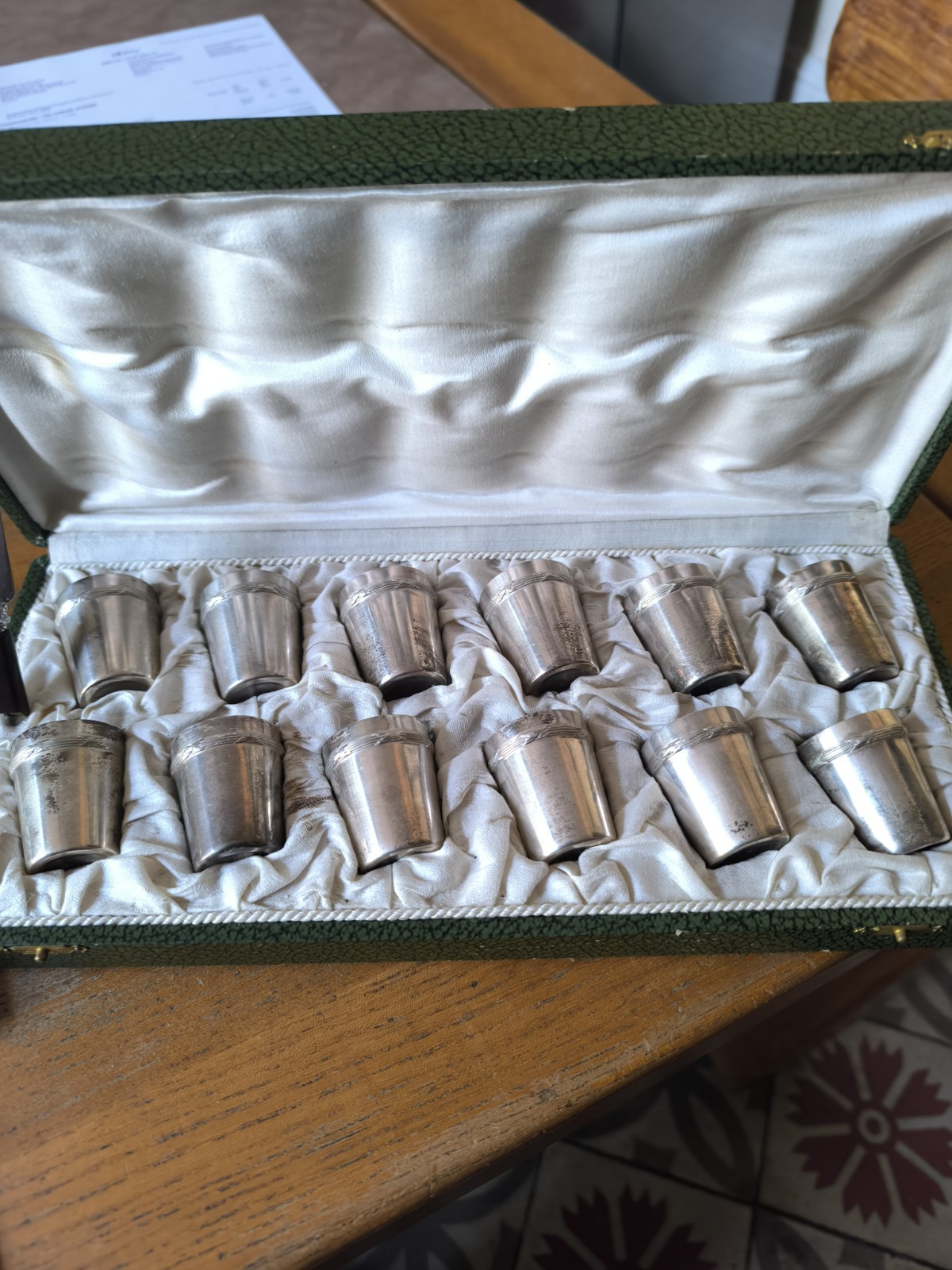 Set Of Twelve Small Shot Glasses In Silver Plated Metal In Punched Case