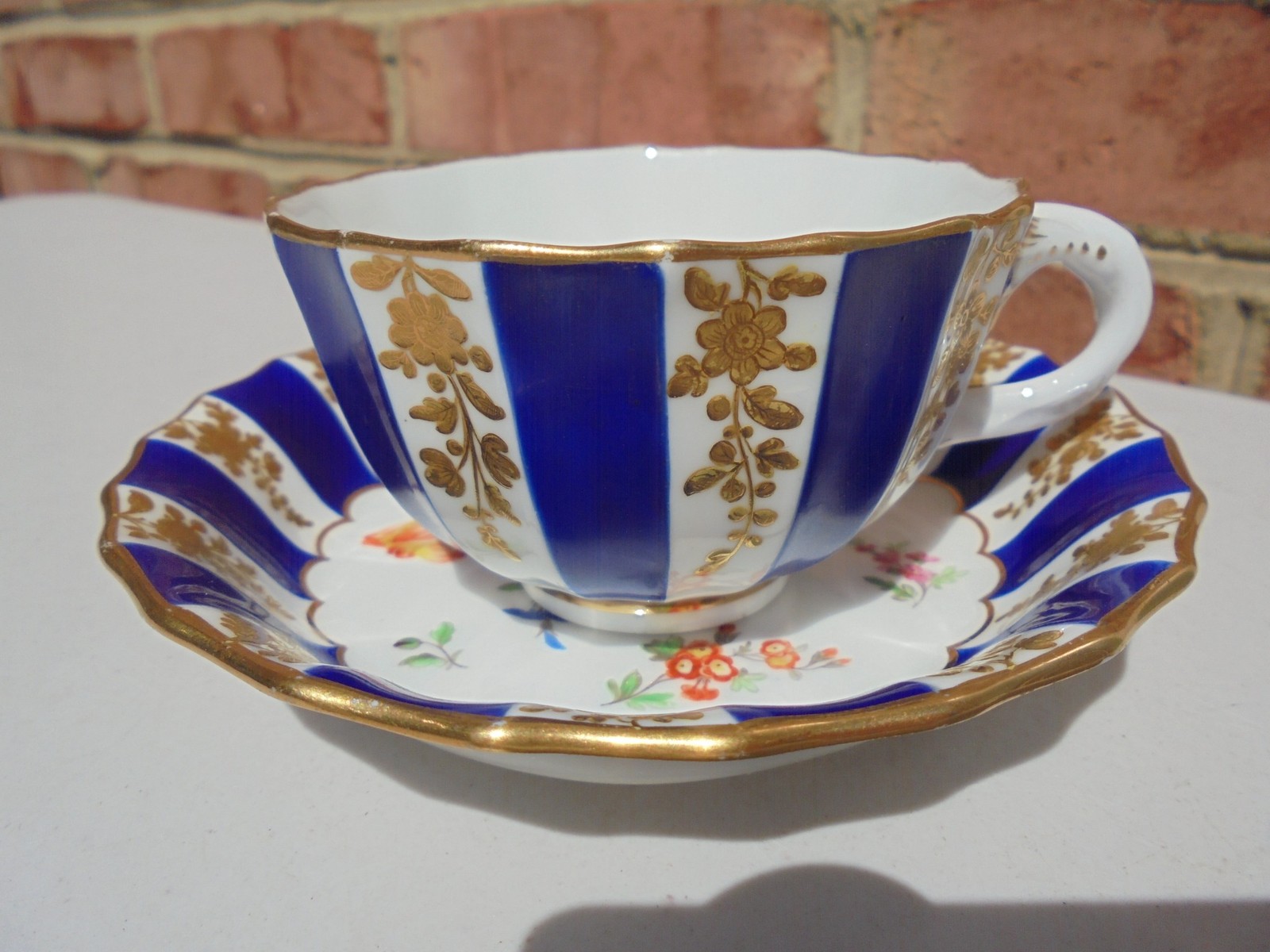 Antique Porcelain Hand Painted Cup & Saucer Blue Stripes Floral Raised Gold