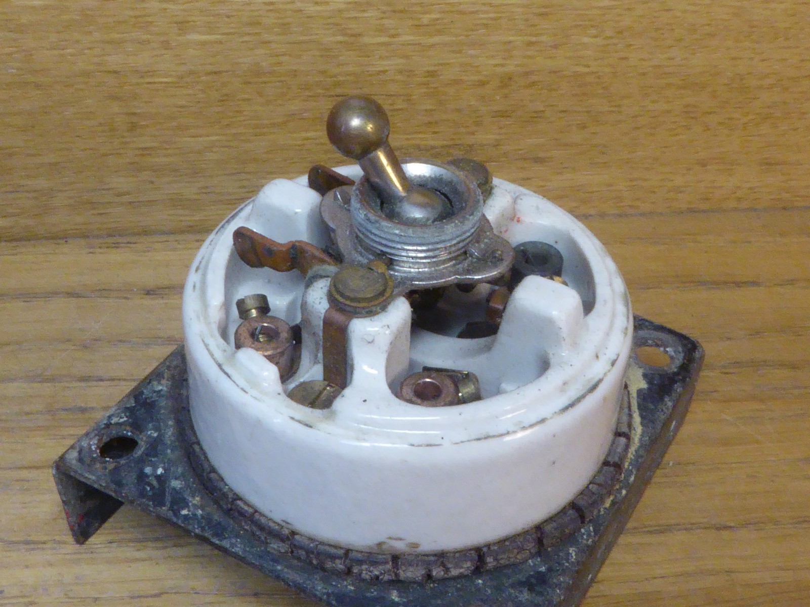 Antique Crabtree Ceramic Dolly Switch with Brass cover.Single gang light switch