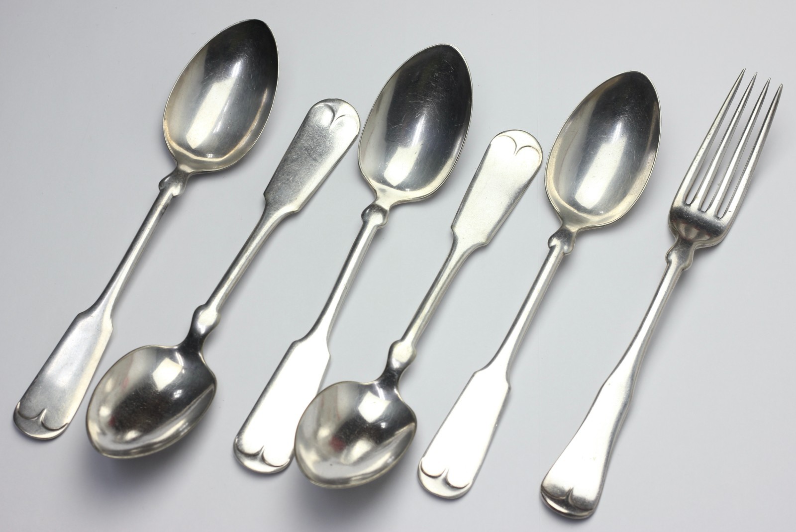 Five Silver Plated Fiddleback Spoons and One Fork by Rogers Silver United States