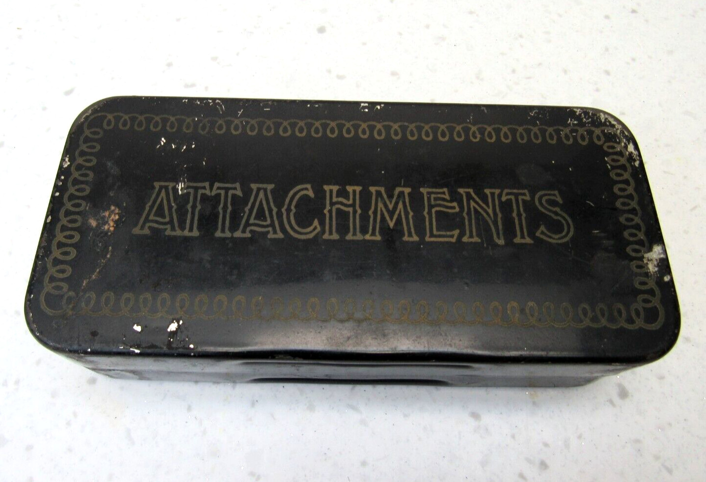 Antique Sewing Machine Attachments in original metal Box