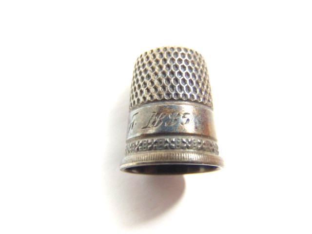 antique sterling silver #7 thimble; shield in dome; monogramed “M to F 1885”