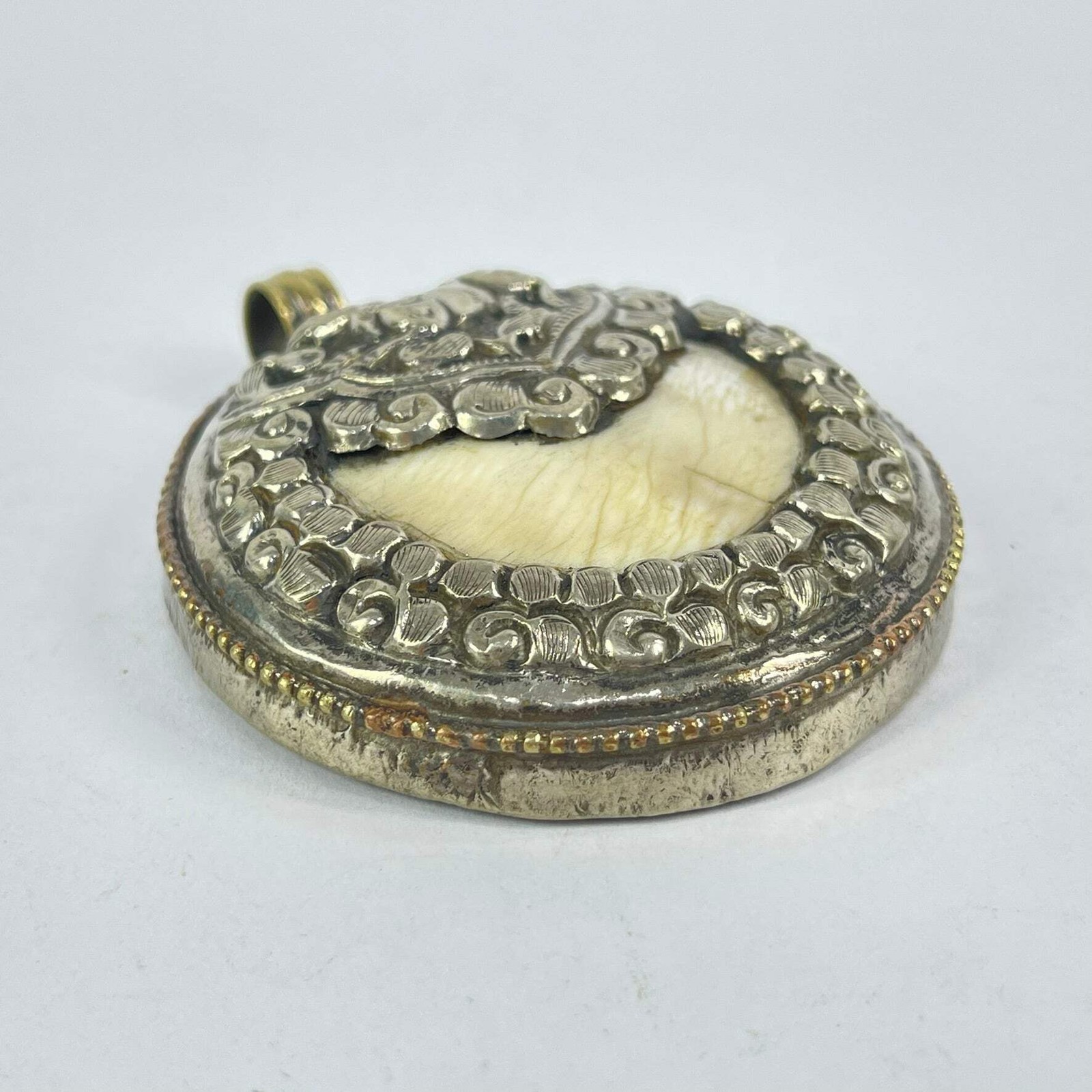 Tibetan Chank Shell Repoussé Pendant