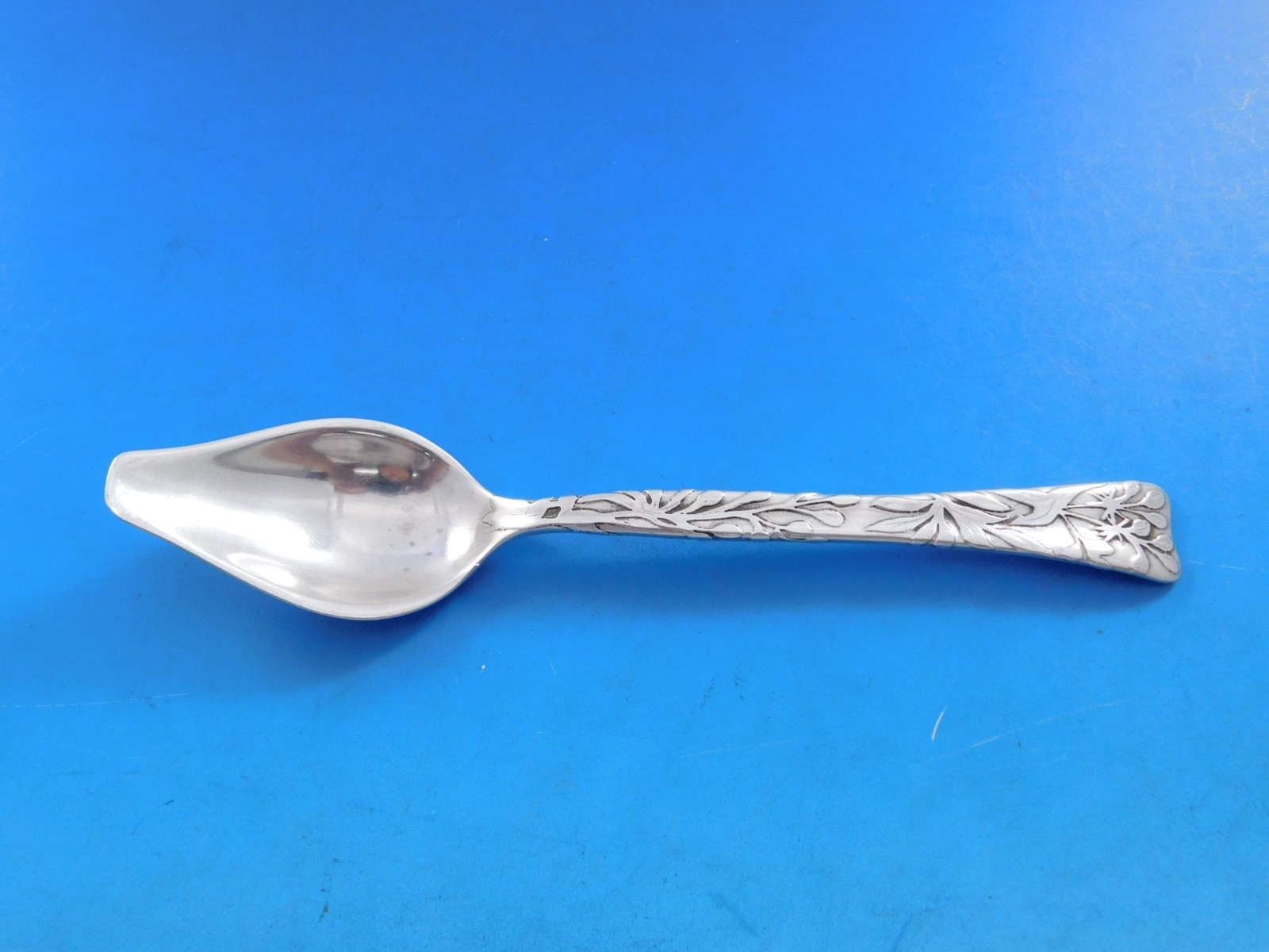Lap Over Edge Acid Etched by Tiffany Sterling Melon Spoon with Flowers 6″