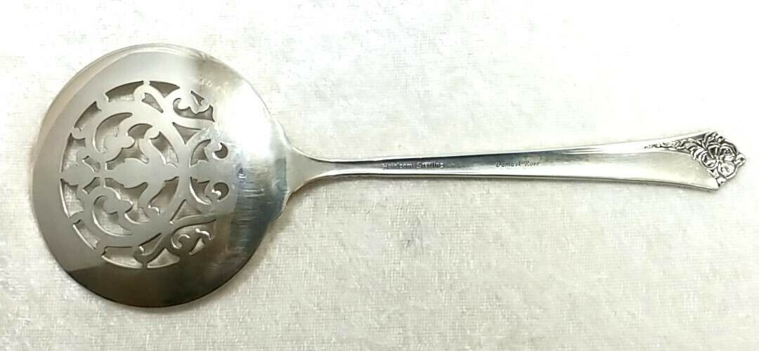 Heirloom (ONEIDA) Sterling Damask Rose Tomato Server Spoon No Monogram