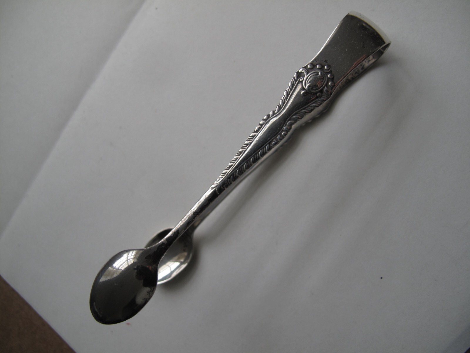 Hallmarked silver tongs – S.I.Ld – Stokes & Ireland Ltd – Chester 1910