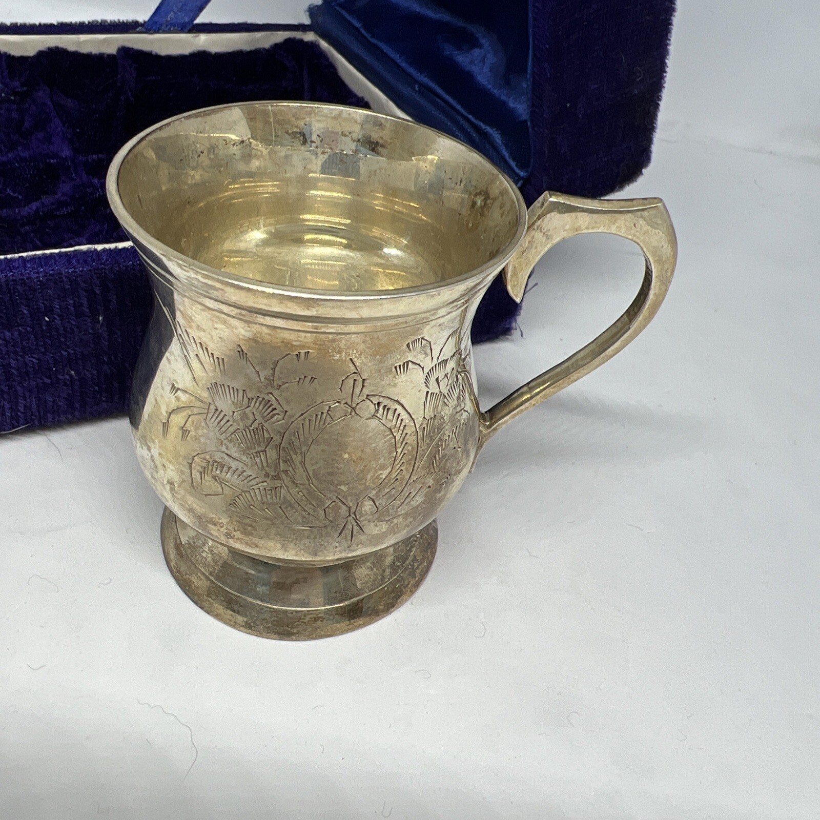 Antique Miniature Silver Cup in velvet blue box etched with flowers. Pre-loved