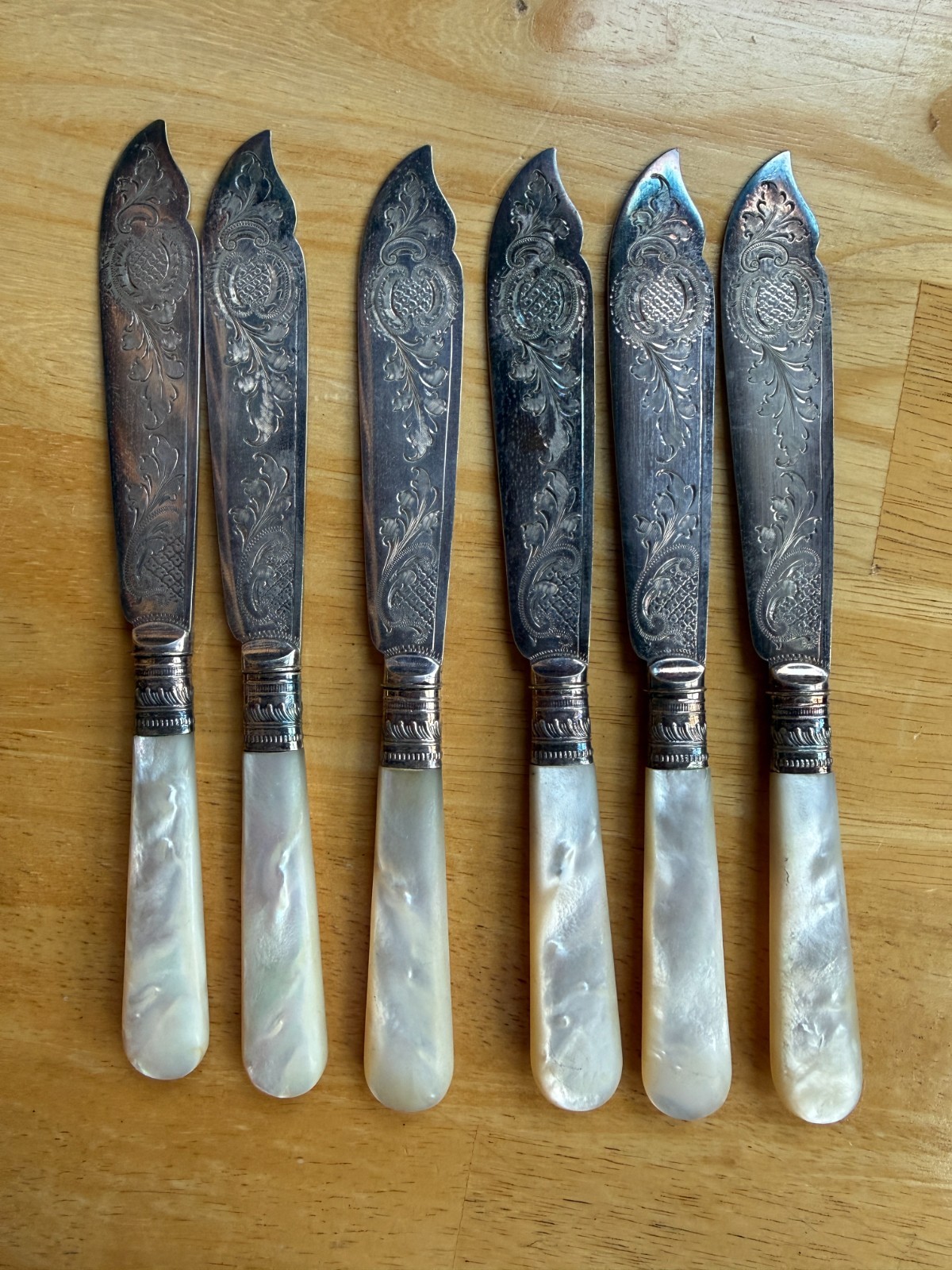 Antique Set of 6 Mother of Pearl Handled Etched Fish Knives