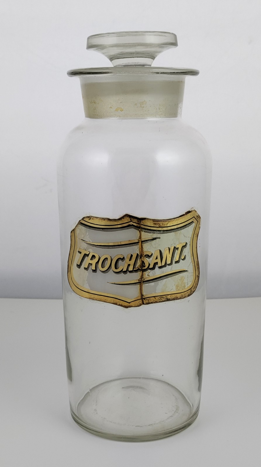Antique 9.5″ Glass Apothecary Jar w/ Stopper Troch.Sant Label Under Glass