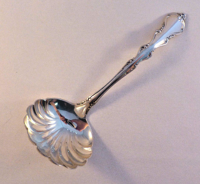 ANGELIQUE-INTERNATIONAL STERLING GRAVY LADLE