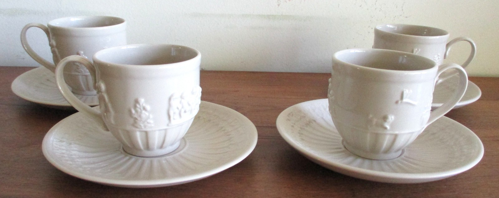 WEDGWOOD CREAMWARE EMBOSSED CHILDREN AT PLAY DOG & DRAGONFLY CUPS & SAUCERS MINT