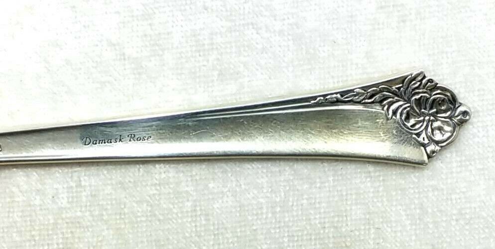 Heirloom (ONEIDA) Sterling Damask Rose Tomato Server Spoon No Monogram