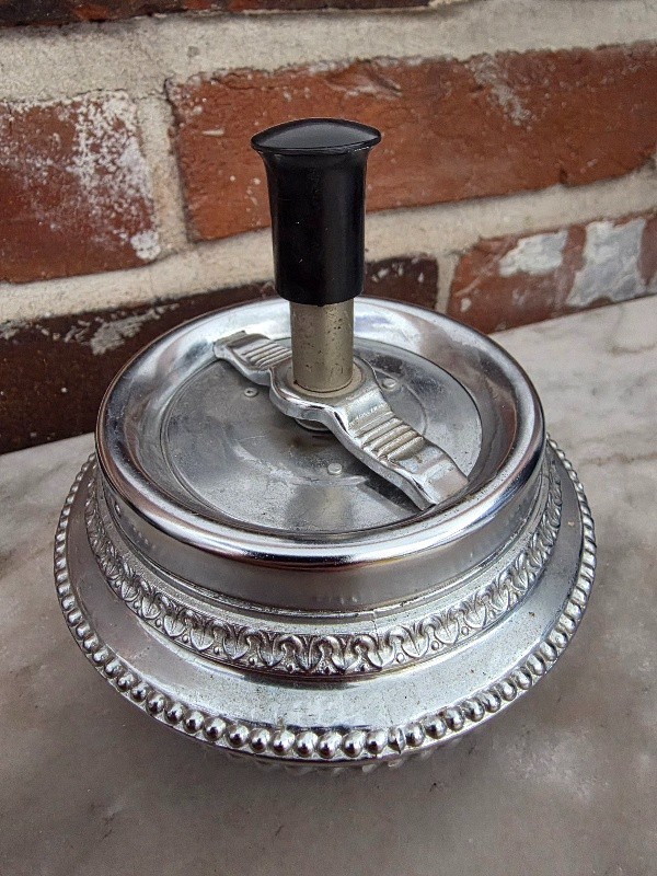 Vintage tabletop spinning ashtray, antique Queen Anne style, silver ornate base
