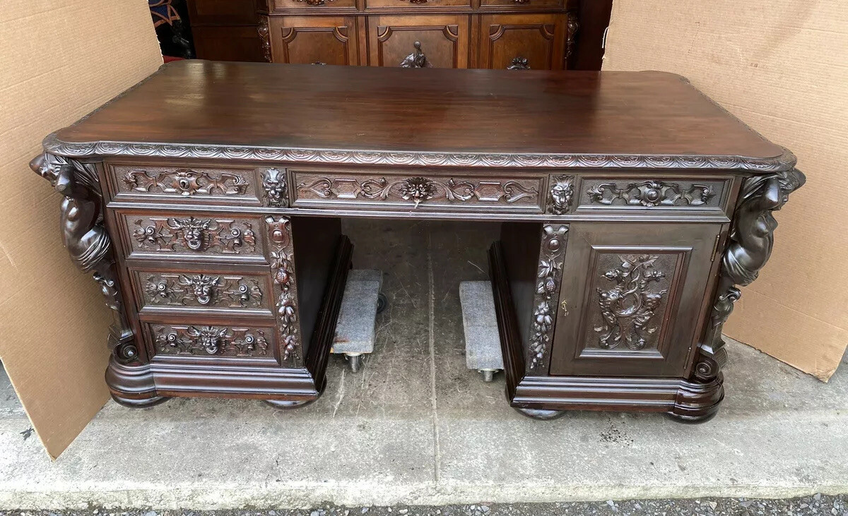 R. J. HORNER CARVED MAHOGANY FIGURAL PARTNERS DESK
