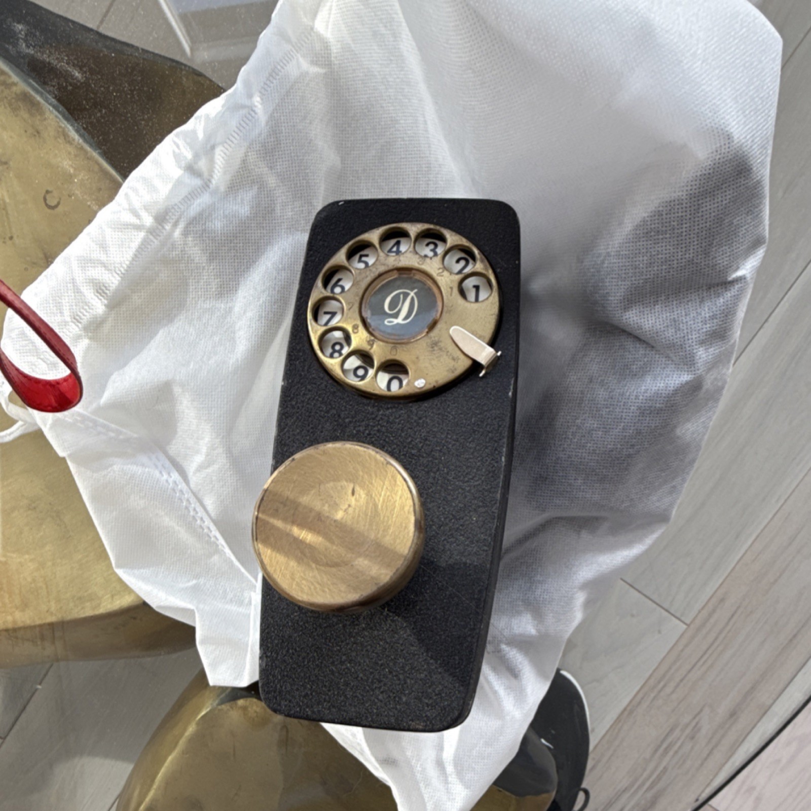 Brass and Black Round Door Knob Set with Rotary Telephone Dial Design