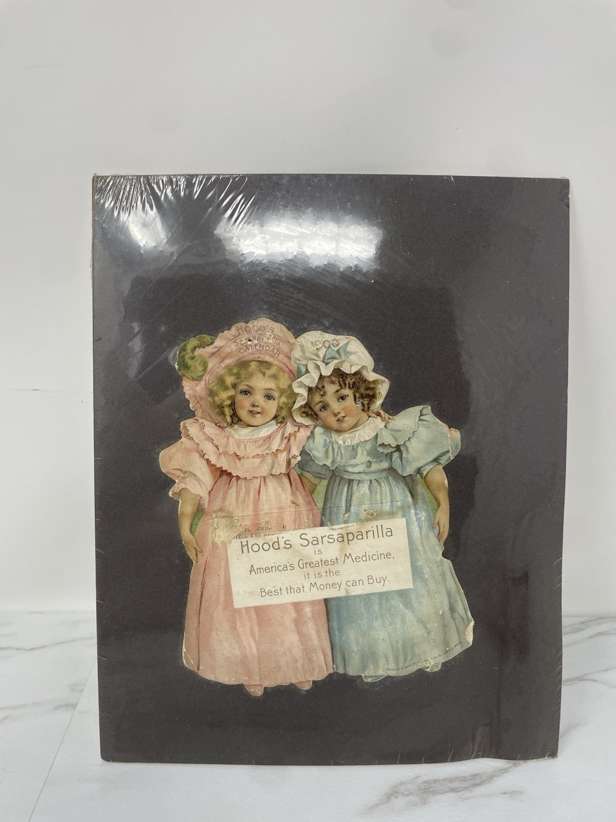 1900 Diecut Hood’s Sarsaparilla Calendar – 2 cute little girls