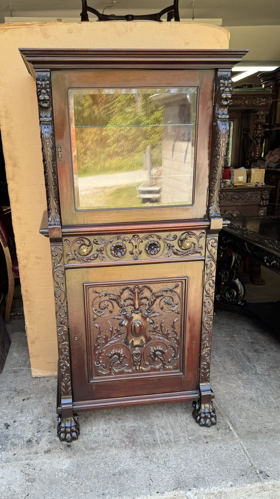 R.J. HORNER CARVED GRIFFIN LIQUOR BAR CABINET