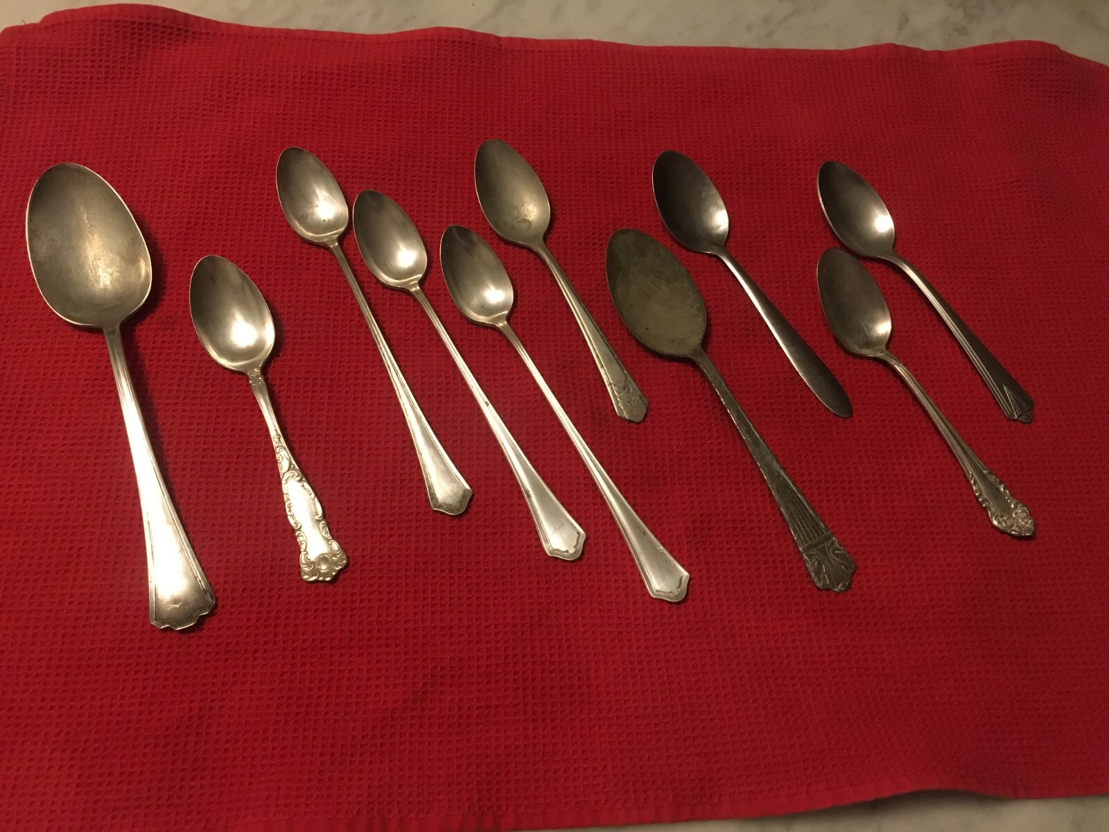 LOT OF TEN (10) VINTAGE SPOONS – PLYMOUTH, WM ROGERS & SON, ONEIDA, IMPERIAL, LA