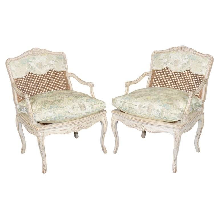 Pair Louis XV Style French Cream Distressed Painted Cane Back Armchairs