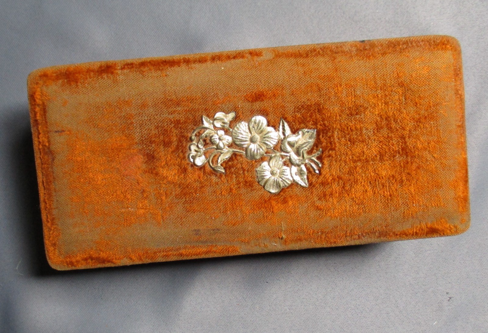 Antique burnt orange vanity box for a brush , comb , nail file handkerchiefs