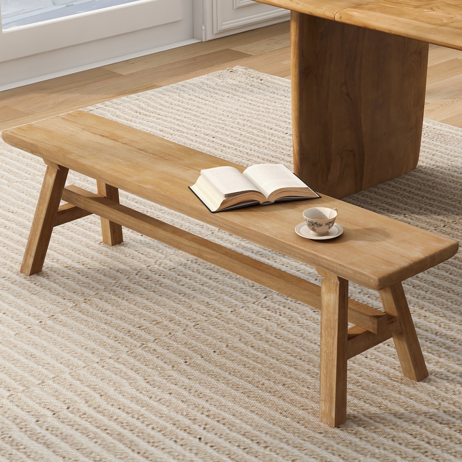 This solid wood bench measures 55“ with built-in storage for indoor spaces