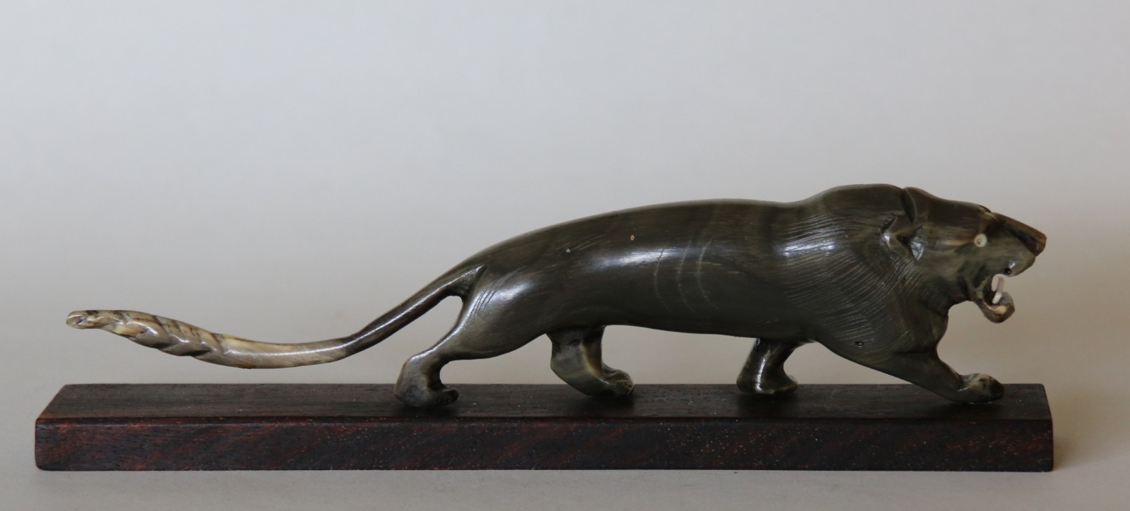 Antique Vintage Hand Carved Horn Lion on Hardwood Stand 22.5cm Long