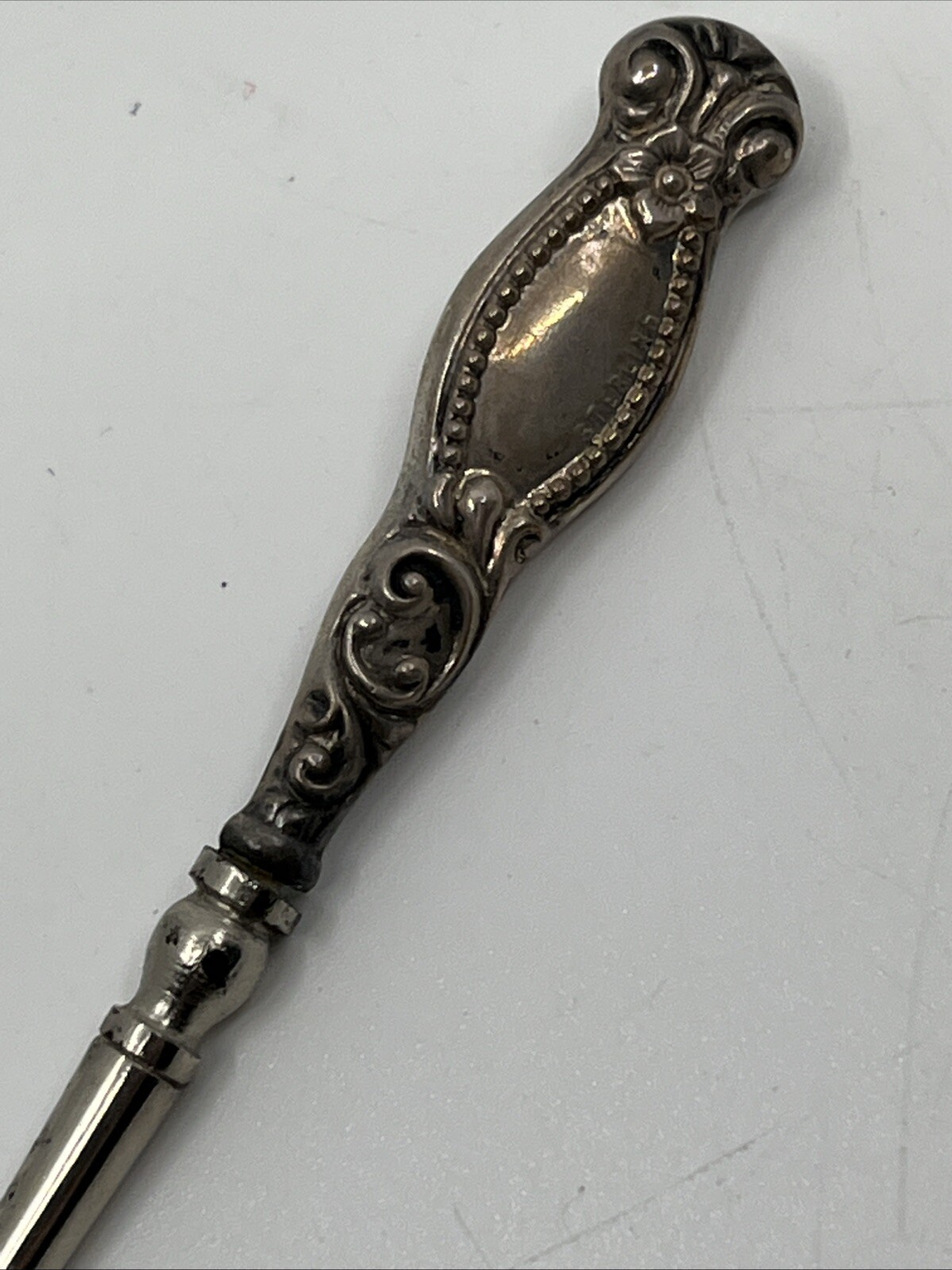 Antique Sterling Silver Button Hook 3 5/8” Repousse Flower Floral Scroll