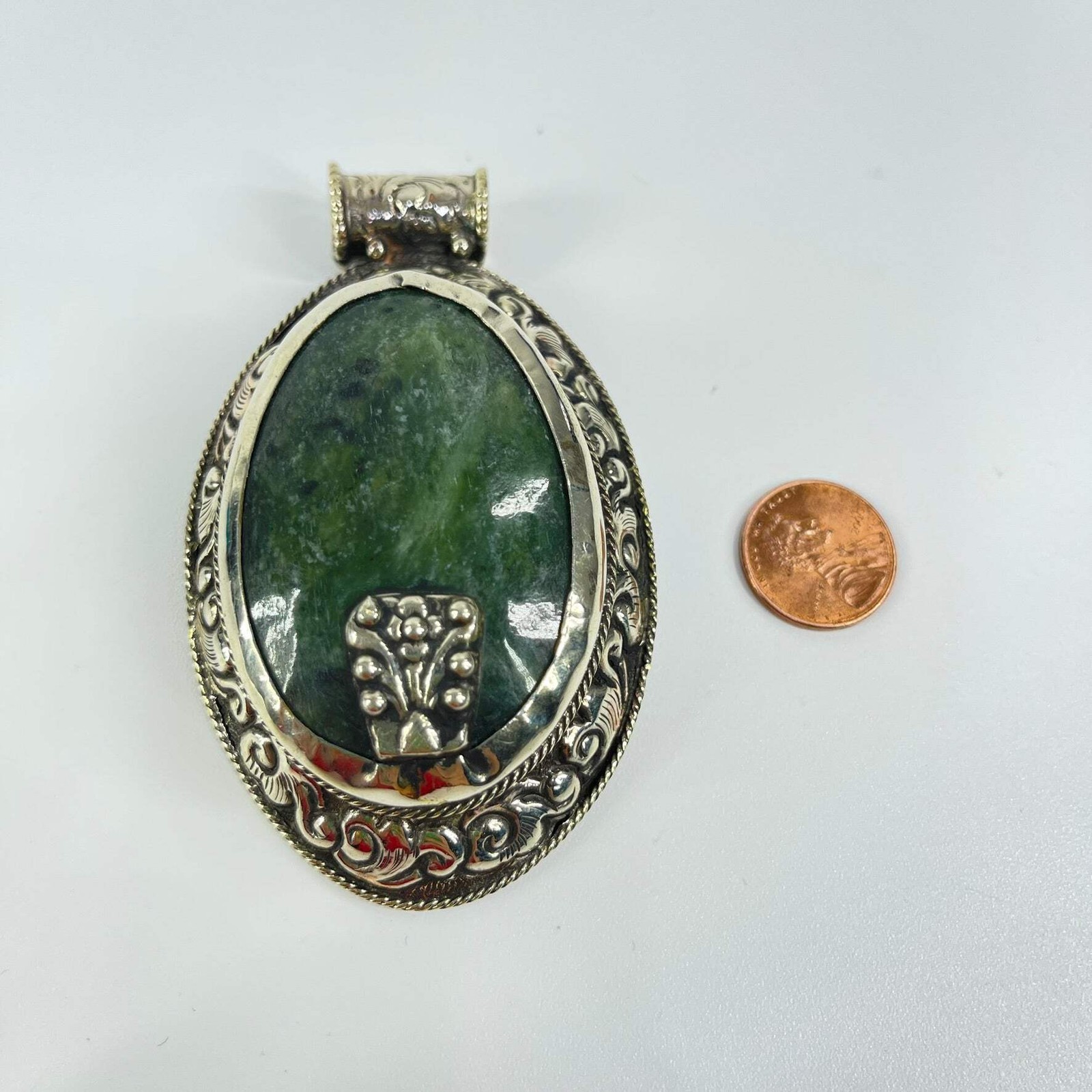 Tibetan Serpentine Silver Repoussé Pendant