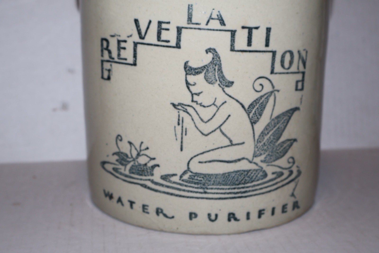 RARE CROCK COBALT DECORATED FAIRY “REVELATION WATER PURIFIER” STONEWARE 1910